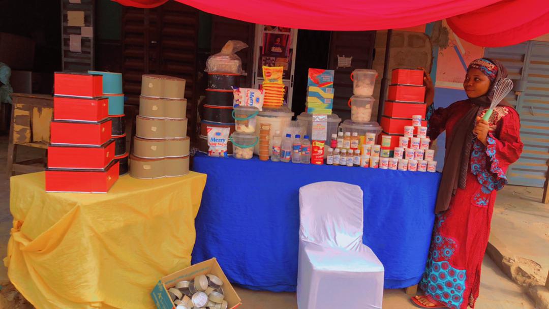 chef standing near her kiosk